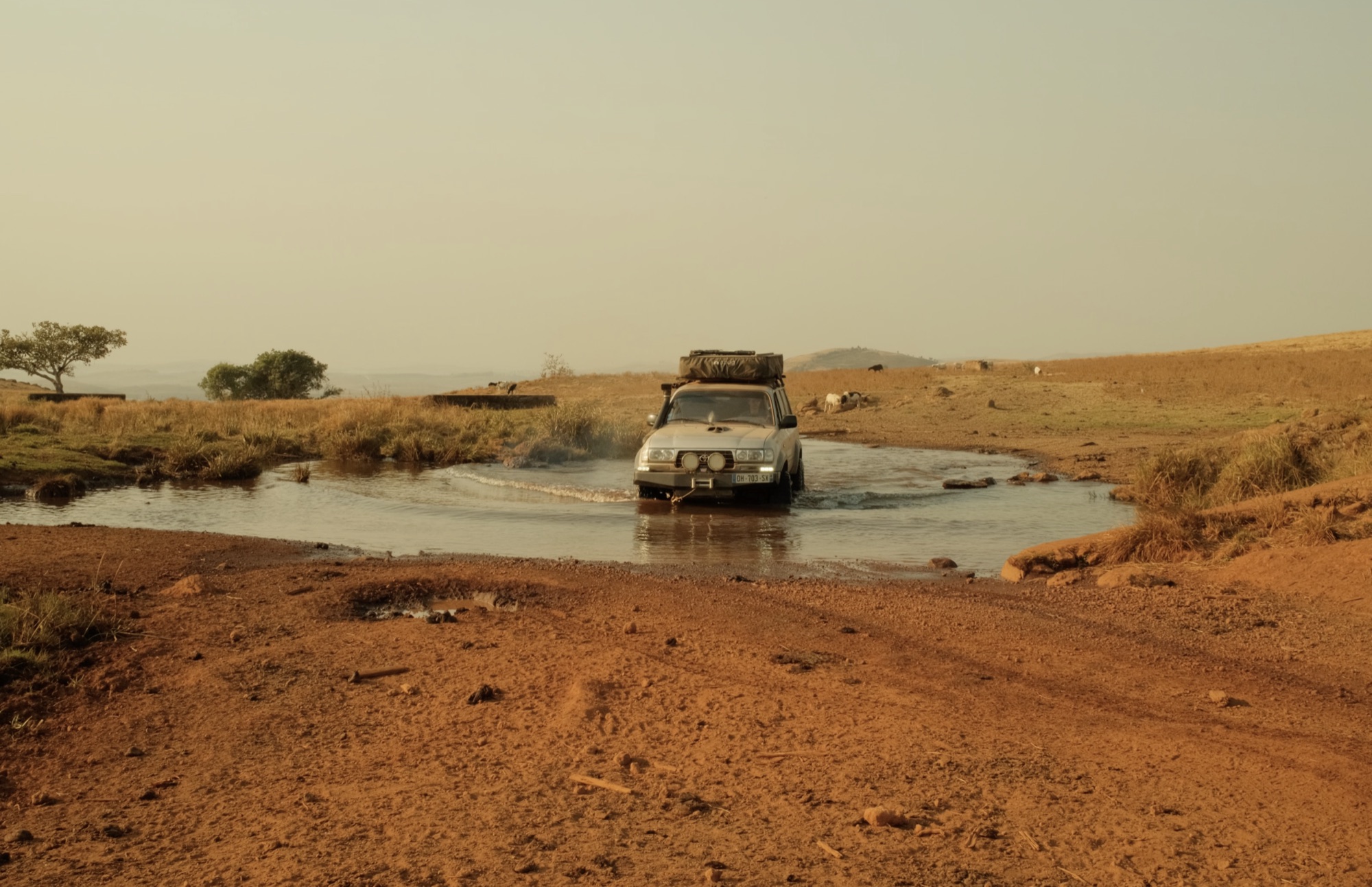 The Toyota Land Cruiser crossing a river in Nigeria